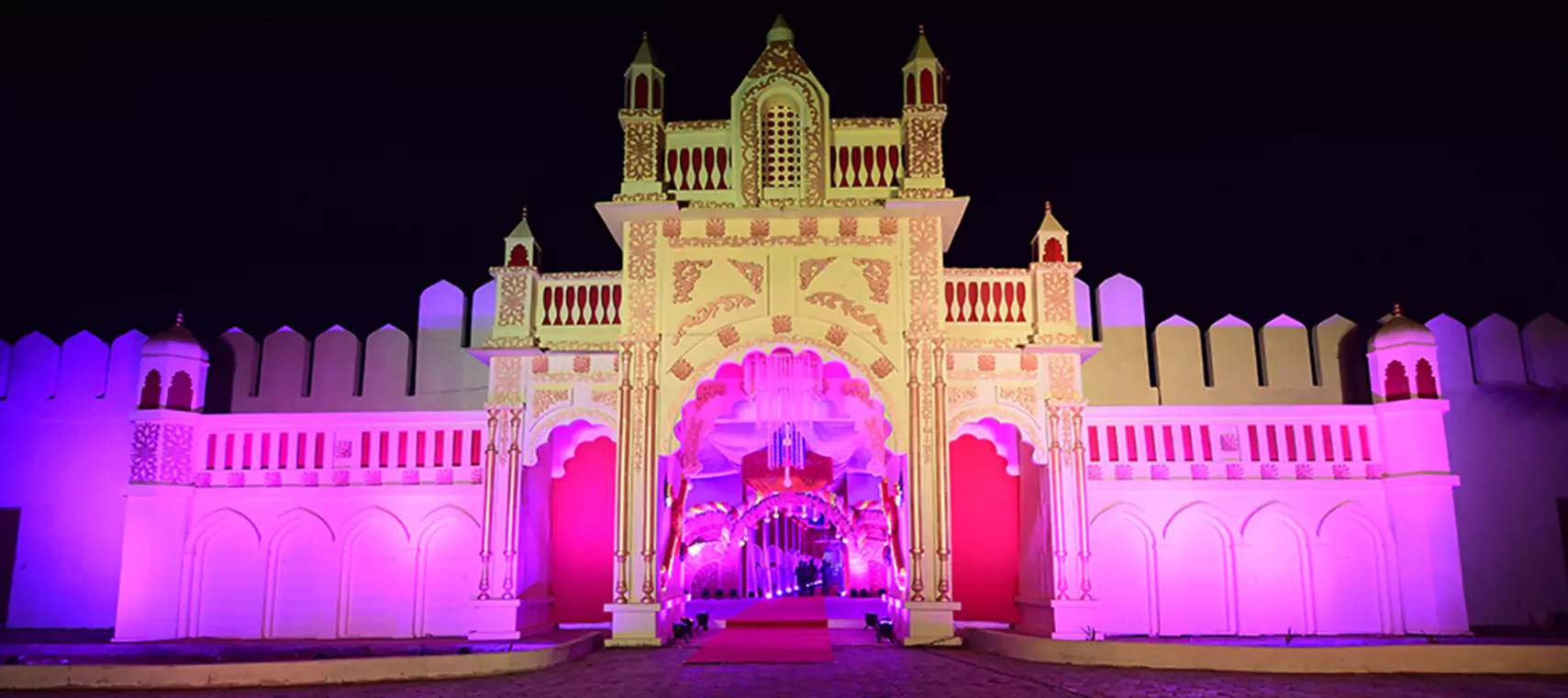 Decorated event hall with purple lighting